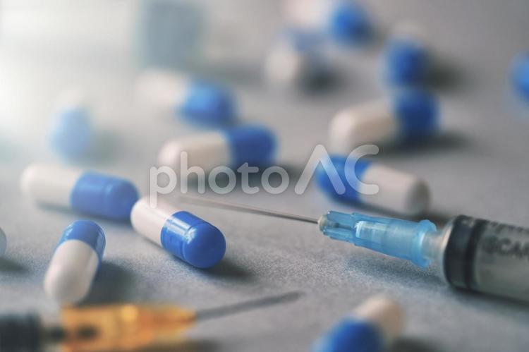 注射器とカプセル 薬,注射器,医療の写真素材