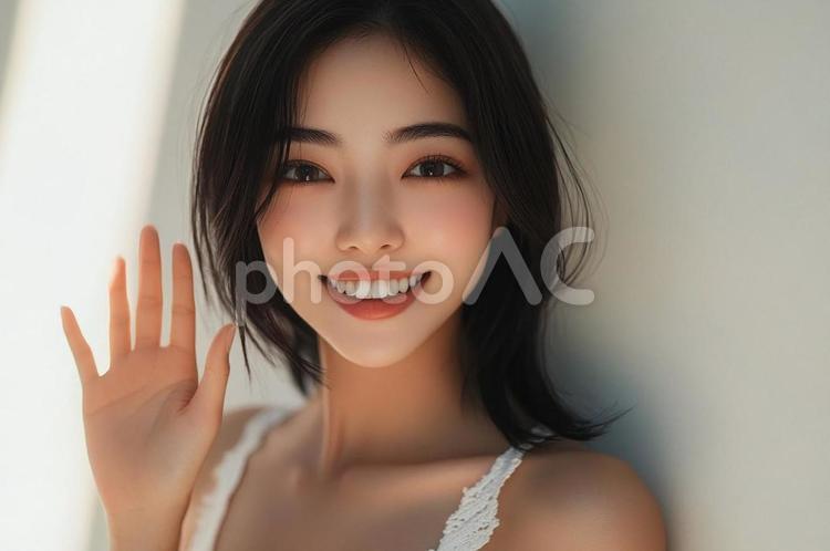手を振る笑顔の日本女性 女性,モデル,美人の写真素材