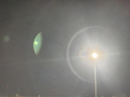 駐車場の照明と夜空とフレア 照明,光,フレアの写真素材