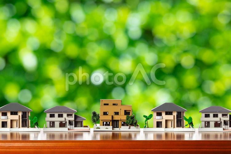 住宅模型と緑背景 ビジネス,住宅,家の写真素材