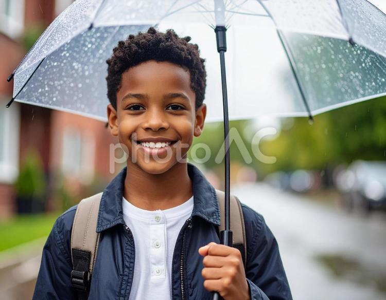 黒人の少年が傘を差す ai生成,黒人,傘の写真素材