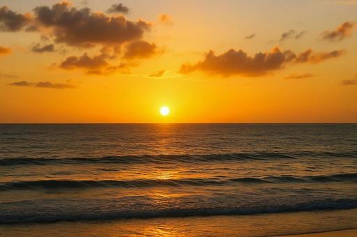 夕日が沈む静かな海辺・サンセット・夕暮れ 夕日が沈む静かな海辺・サンセット・夕暮れの写真