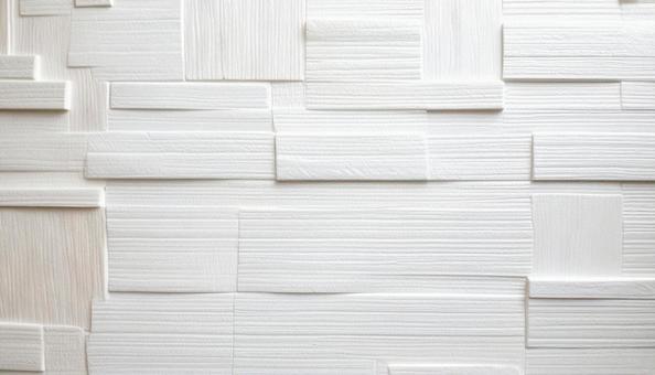 白いレンガ調の立体的なテクスチャ背景素材 白いレンガ調の立体的なテクスチャ背景素材の写真