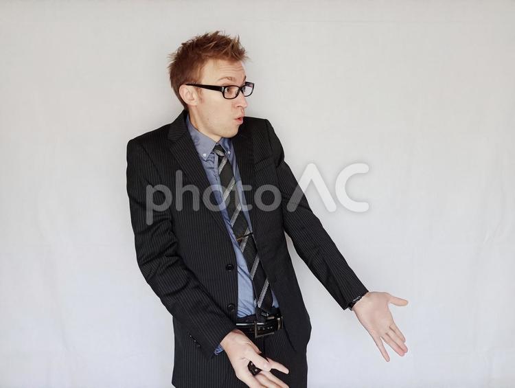 なんで？なぜ？どうやって？疑問ジェスチャー ビジネスマン,ビジネス,スーツの写真素材