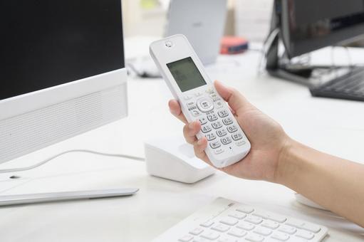 Woman answering the phone, fixed-line phone, office, machine, JPG