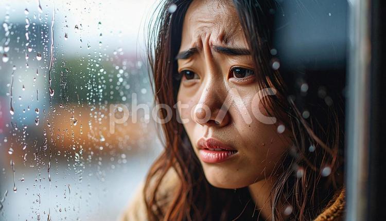 泣き顔の日本人の女性 涙,泣き顔,悲しいの写真素材