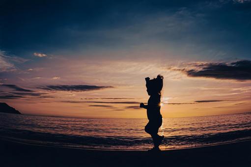Children running on the beach at sunset, JPG
