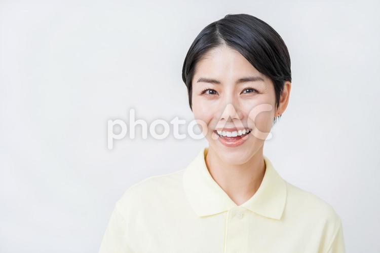笑顔の介護士の女性。 介護,介護福祉士,介護士の写真素材