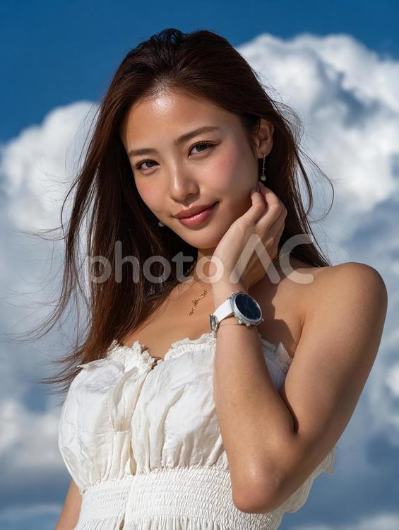 風を感じる屋外での、自然体で魅力的な女性 女性,笑顔,日本人の写真素材