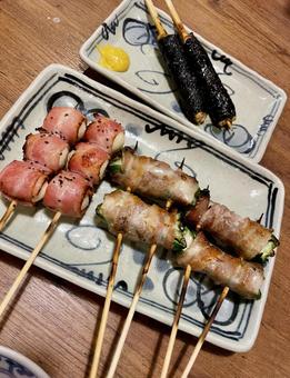 Photo, grilled skewers, bacon, quail, 