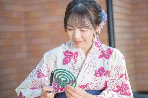 蚊取り線香と浴衣女性 浴衣,女性,和装の写真素材