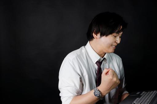 成功を喜ぶビジネスマン ビジネスマン,成功,喜びの写真素材