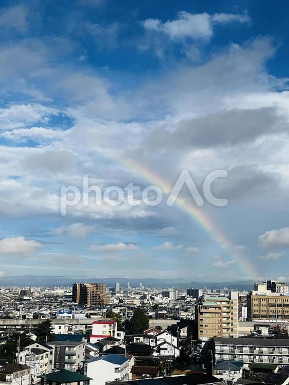 消えかけ始めた虹 虹,空,雲の写真素材