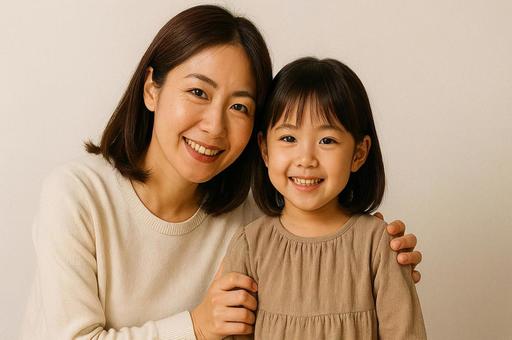 笑顔の親子ポートレート母と女の子・家族愛の写真