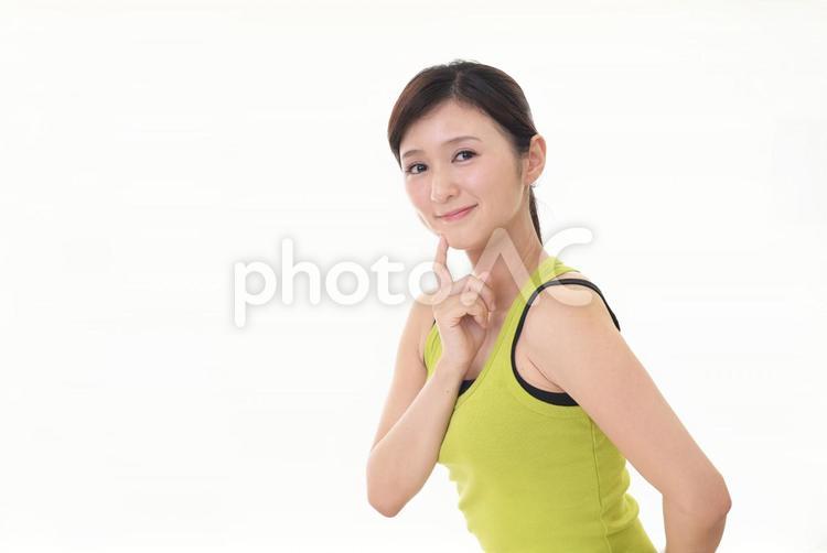 タンクトップを着た笑顔の女性 女性,ダイエット,主婦の写真素材