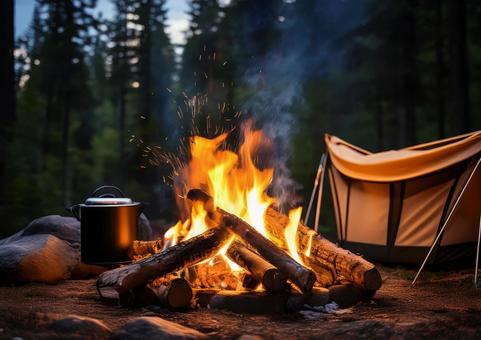 キャンプで焚火の写真