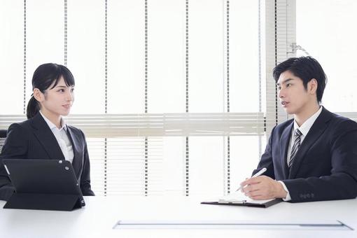 Business person talking in a conference room, conference, discussion, meeting, JPG