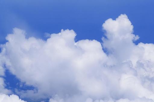 Beautiful clouds and ocean captured from the air, helicopter shot, blue sky, sea, JPG