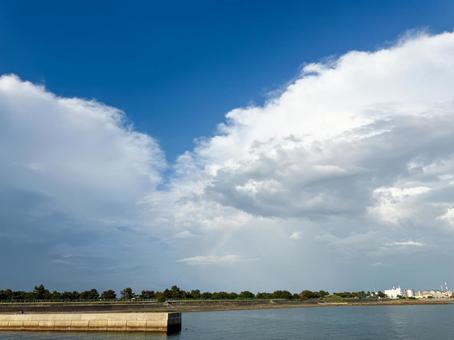A breakwater overlooking the sea, blue sky and clouds, JPG A breakwater overlooking the sea, blue sky and clouds, JPG