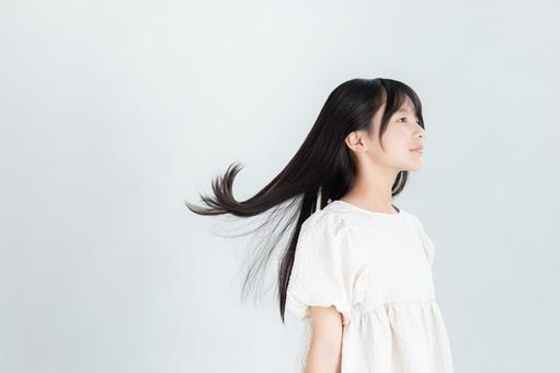 ロングヘアの健康的な女の子 ロングヘアの健康的な女の子 ロングヘア,笑顔,女の子の写真素材
