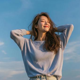 Portrait of a smiling face feeling the wind, female, asian, natural light, JPG