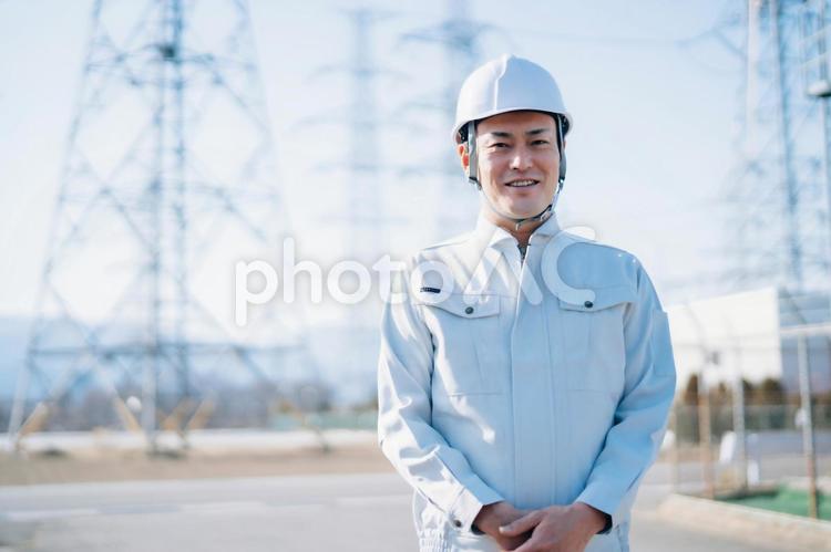 電気工事士・電力会社・作業着を着た男性 電力会社,電気工事士,作業員の写真素材