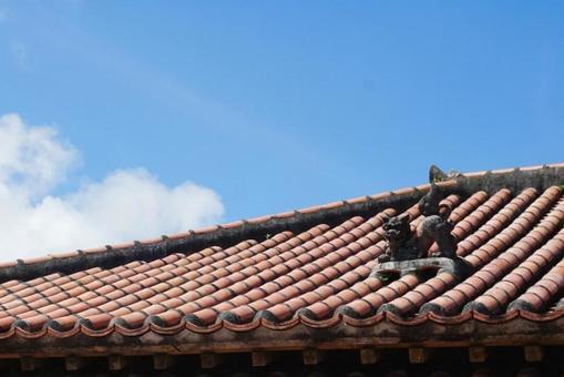 Blue sky, red roof tiles and Shisa, JPG