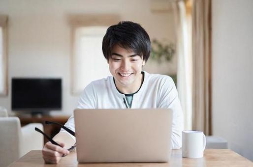 Asian man talking online with a smile, male, online meeting, conference, JPG