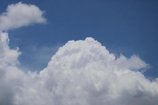 A summer skyscape with blue skies and clouds, JPG