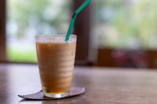 グラスに入ったアイスカフェオレ アイス,カフェオレ,カフェの写真素材