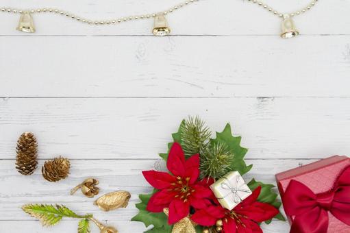 クリスマスの飾りと中央余白 クリスマス,ポインセチア,プレゼントの写真素材