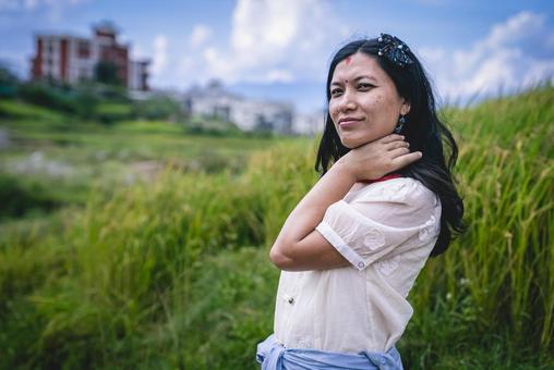 稲穂とネパール人女性 ネパール,女性,ティカの写真素材