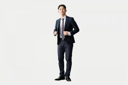 スーツ姿の男性ビジネスマン(全身) スーツ姿の男性ビジネスマン(全身) ビジネス,ビジネスマン,男性の写真素材