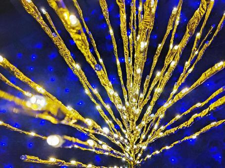 ブルーを背景にしたゴールドの光 ブルーを背景にしたゴールドの光 イルミネーション,ライトアップ,クリスマスの写真素材
