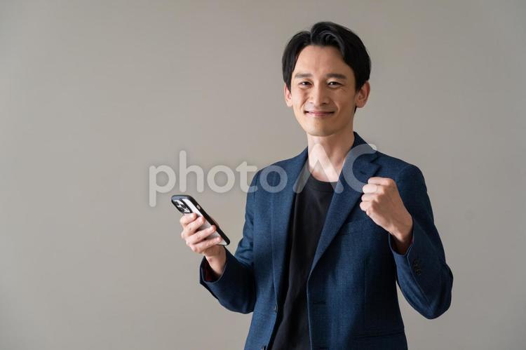 ポーズをとるジャケットを着た男性 ビジネス,ビジネスマン,仕事の写真素材