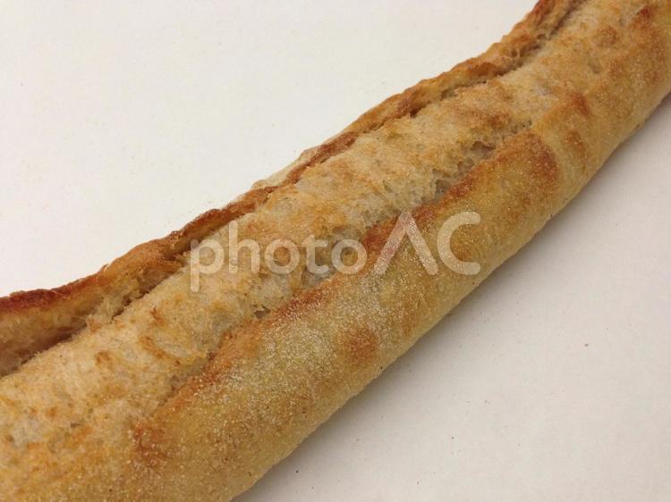 1本線のフランスパンのクープ、割れ目 バゲットカンパーニュ,パン,フランスパンの写真素材