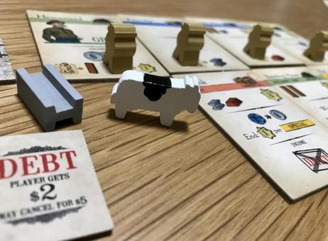 借金と牛、荒野の取引 ボードゲーム,牛,コマの写真素材