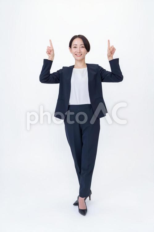 指をさす女性 会社員,営業,キャリアの写真素材