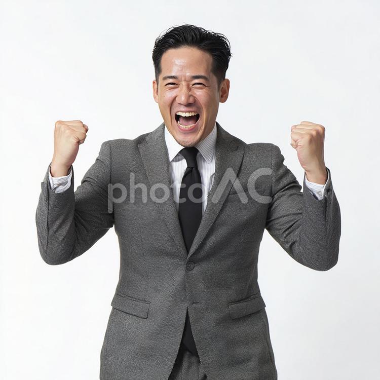 活気に満ちた表情で喜びを分かち合う男性 男性,ビジネスマン,大人の写真素材