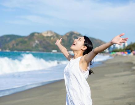 Smiling woman enjoying the feeling of freedom at the beach, sea, a smile, free, JPG