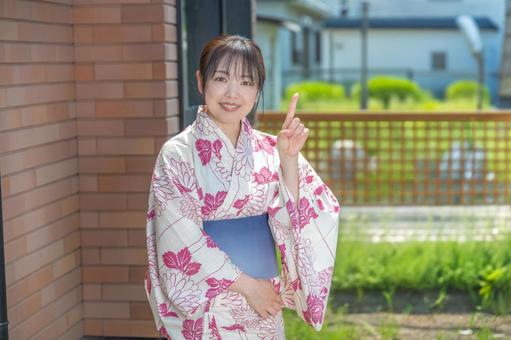 Yukata woman pointing, JPG