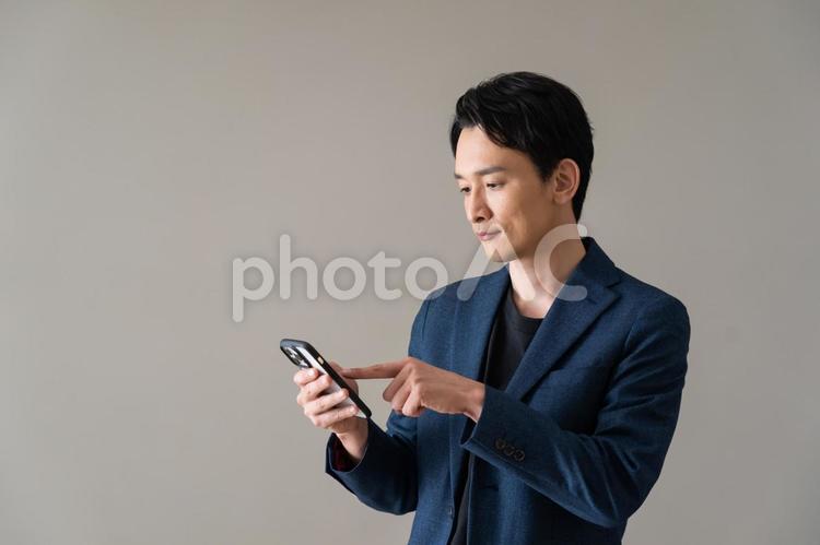 ポーズをとるジャケットを着た男性 ビジネス,ビジネスマン,仕事の写真素材