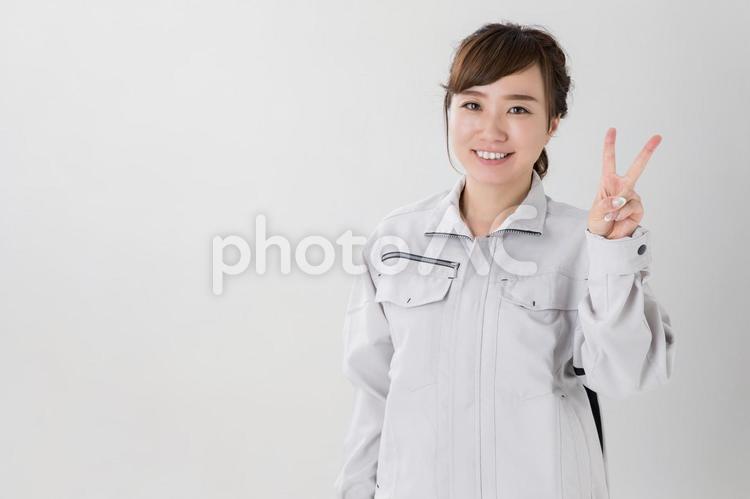作業服をきたビジネスウーマン 作業服,女性,作業着の写真素材