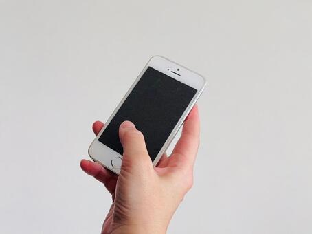 スマートフォンを操作する手元（シンプル） スマホ,手元,携帯電話の写真素材