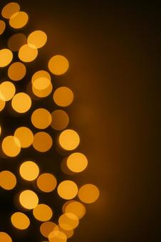 暖色イルミ玉ボケの写真