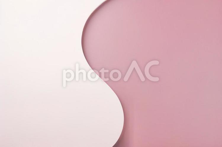 カーブのピンク系の画用紙背景 画用紙,ピンク,ベビーピンクの写真素材