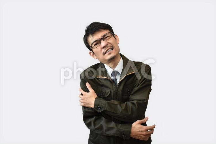 腕を痛めた男性 腕,痛める,肩の写真素材