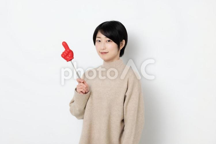 指示棒を持っている笑顔の女性 女性,女子,女の写真素材