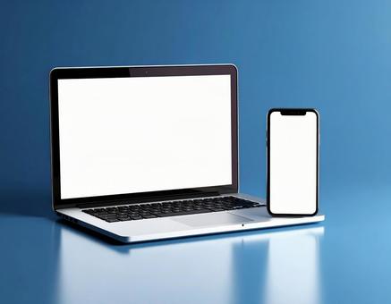ノートパソコンと携帯電話 背景 青 ノートパソコンと携帯電話 背景 青の写真