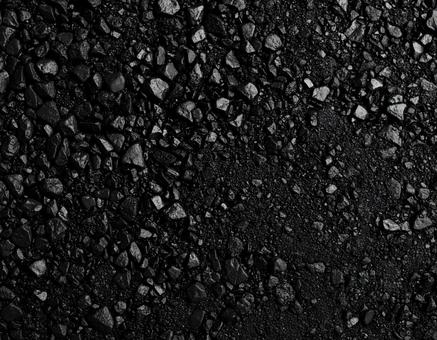 小石が混じった黒い道路のテクスチャ 小石が混じった黒い道路のテクスチャの写真